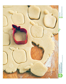 Apple Shaped Cookie Cutter On Raw Cookie Dough Royalty Free Stock