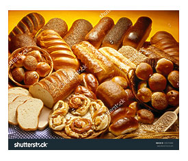 Bakery Product Assortment With Bread Loaves, Buns, Rolls And Danish