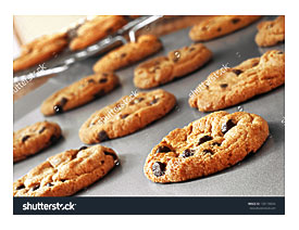 Chocolate Chip Cookies On Non stick Cookie Sheet With Cooling Rack