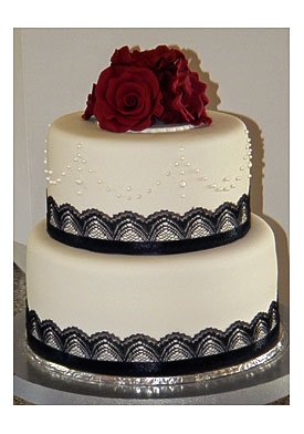 Black Lace On The Borders Of The Cake. Royal Icing Decoration On The