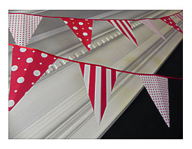 Red And White Pennant Banner Hanging Inside Meant For Outside But