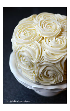 Heart Baking Red Velvet Cake With Cheesecake Middle And Piped Roses