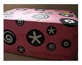Cute Pink Shipping Box With The "cupcake" Patterns Throughout