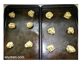 Cookies Are On The Cookie Sheet, Take Your Straw, And Make The Holes