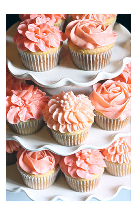 The Star Of The Show Was The Coral Cupcakes With Flower Icing And