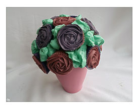 Cupcake Bouquets Are Arranged In A Flower Pot To Look Like Roses Or