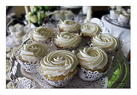 Cupcakes Iced With Vanilla Buttercream And Placed In Lace Wrappers