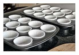 The Oven To 350 Degrees And Line Two Cupcake Trays With Holders
