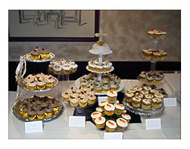 Wedding Cake With Cupcakes Display