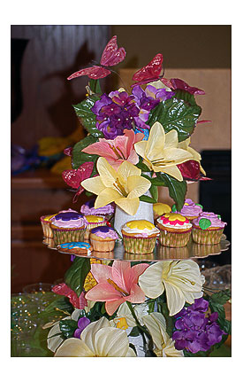 Birthday cupcake stand and flower ornament.