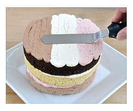 Use Your Spatula To Smooth Out The Icing Being Careful