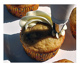 Make A Swirl On The Top Of Each Cupcake By Holding The Bag Straight Up