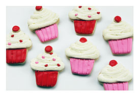 The Cupcakes Are Finished Off With A Mini Circle Cookie With Red Icing